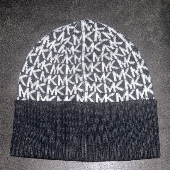 Michael Kors Accessories - Michael Kors Black and White Logo Beanie Never worn
